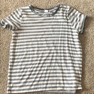 Grey and white stripped shirt.